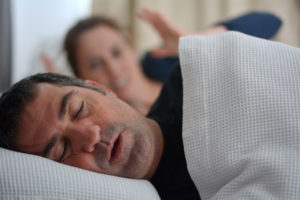 What causes snoring?